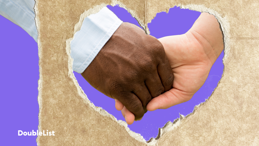 DoubleList graphic featuring a hand with dark skin tone and a hand with light skin tone holding hands in a heart cut out.
